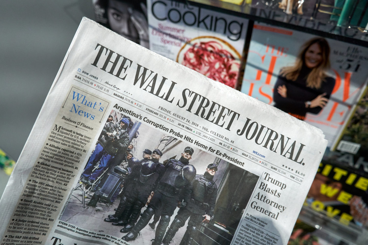 - This Nation The Wall Street Journal newspaper in a hand