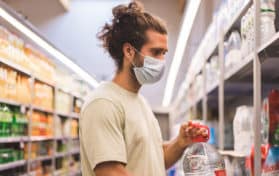 young man wearing a medical mask