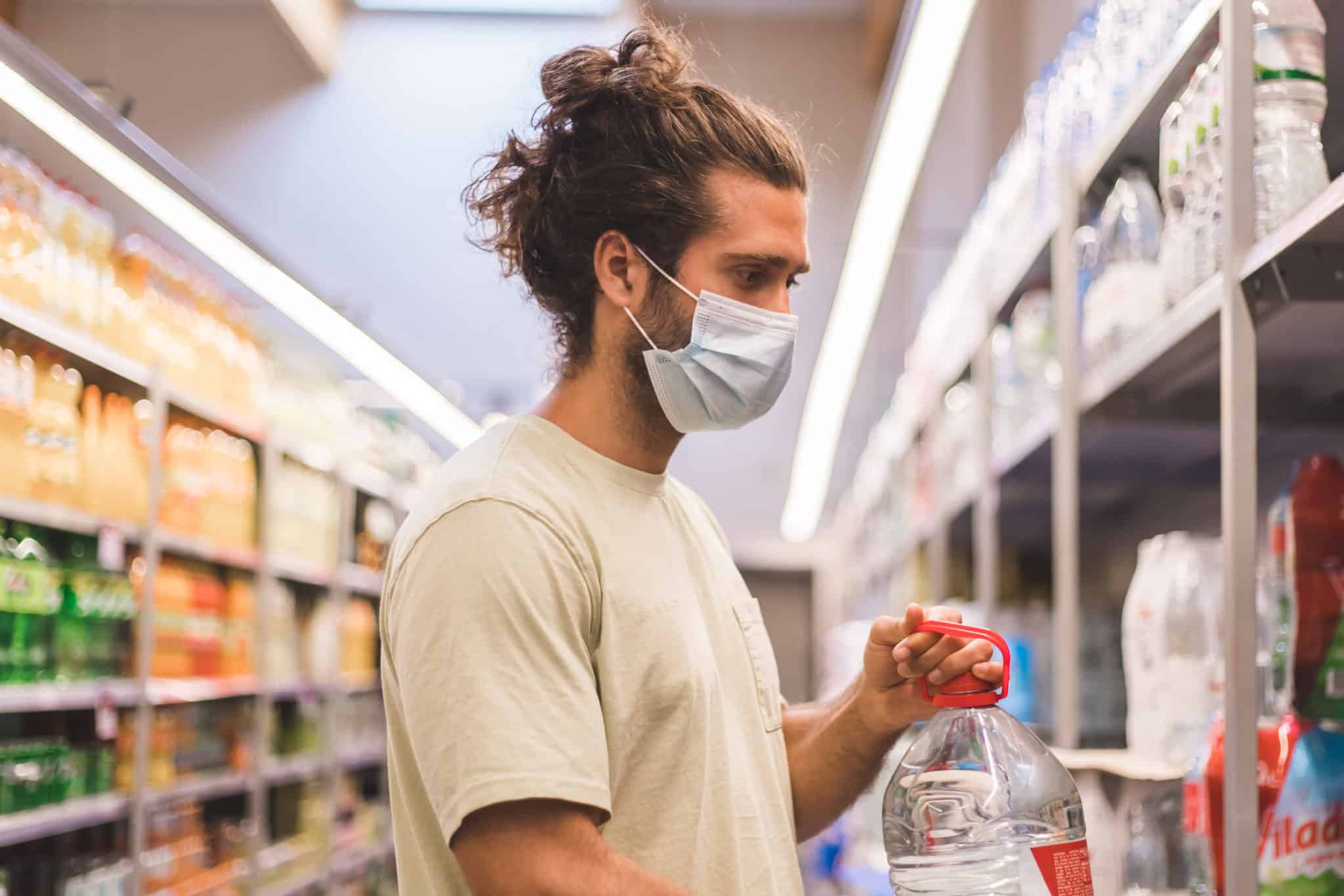 young man wearing a medical mask