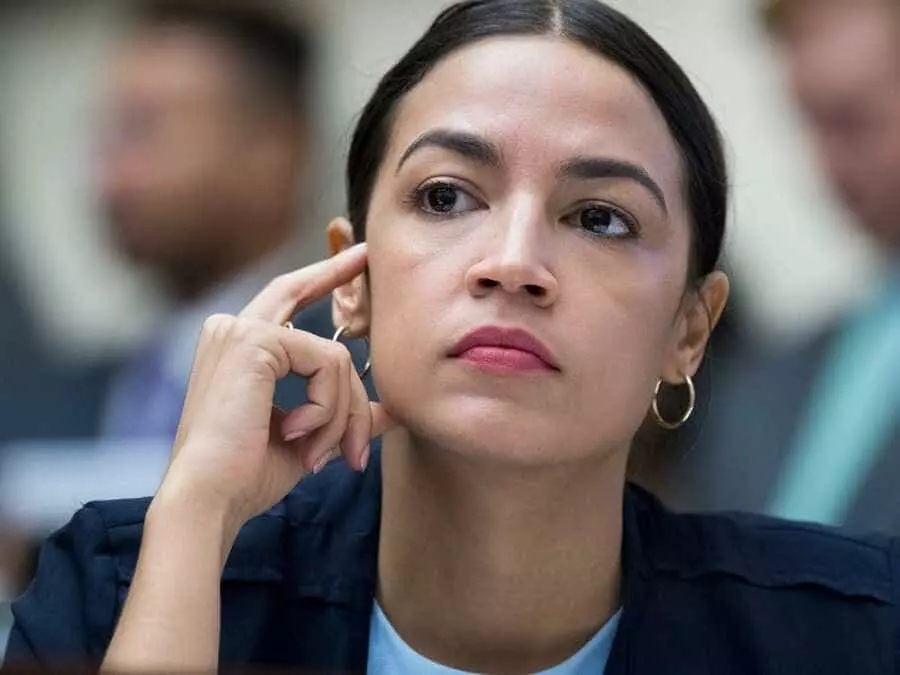 - This Nation AOC listening intently