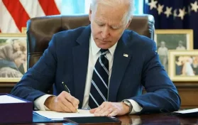Biden signing a bill