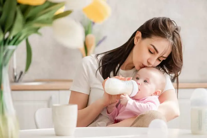 - This Nation mom feeding baby