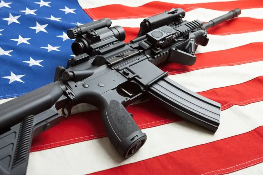 - This Nation gun on American flag