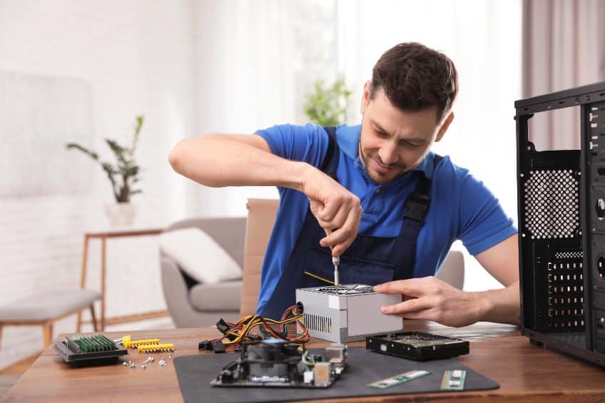 man building a computer